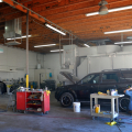 excel-collision-center-technician-buffing-out-the-car-paint-after-accident-repair