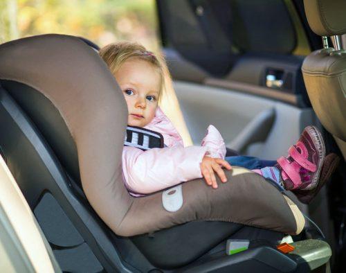 Child protected from collision in car seat